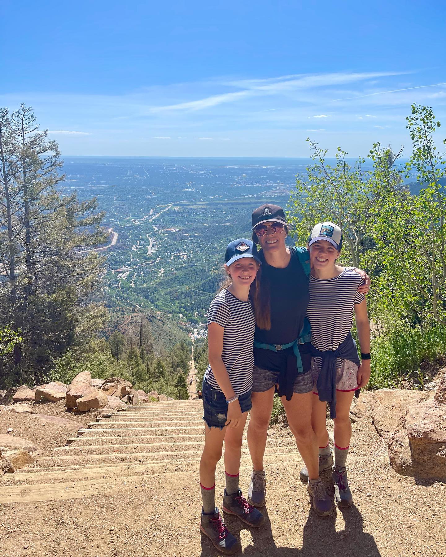 This was 1 million percent my jam. 2768 steps that went straight up a mountain! Yep - I’m a masochist! Luckily, I have 2 little girls following in my footsteps 🤩. . From the moment I first heard about the Manitou Incline, I knew that I wanted to visit Colorado Springs and walk all those stairs. . We only had 3 days and 2 nights scheduled there and I was pretty bummed to find out that due to Covid, you had to make reservations for the Incline and they were totally full. . The state park where we were staying was also booked solid and didn’t have any openings for us to extend. 🤪 . Luckily, at the very last minute the spot next to us (that was supposed to be for a 25 foot rig - ours is 43ft) opened up. We booked it and reserved our spot on Monday for the Incline! Yes, our rig did fit. Though it took up every inch of the site.  . The Incline was awesome and hard. With 2,011 feet of elevation gain in .88 miles, that thing was no joke. And the base sits at 6,600 feet, so breathing was a struggle from the beginning. . We took lots of breaks and drank lots of water and made lots of bribes with our youngest ( ice cream and Gatorade when we were done) but we all made it to the top! . Hannah and I also wanted the challenge of walking back down the stairs while the other 3 of us took the less intense trail back to the bottom. . We were super glad that this worked out and that it was such a great training opportunity for our Rim to Rim hike in the Grand Canyon in September. . Does this sounds like fun to you? Or would you need all the bribes to make it to the top too? _____________________________